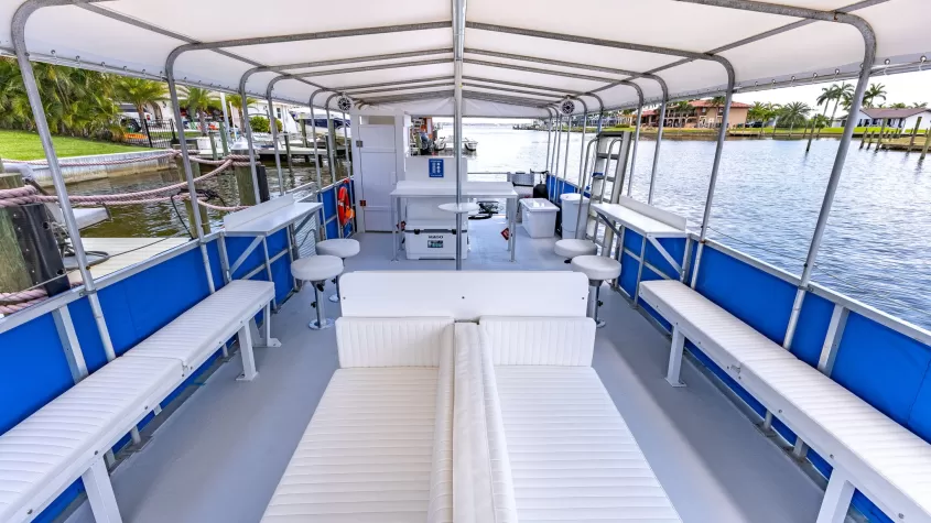 custom designed with comfort, pleasure, and safety in mind with her lounge seating, bar top tables and stools, catering table, Bluetooth sound system, decorative LED lighting, and restroom on board.