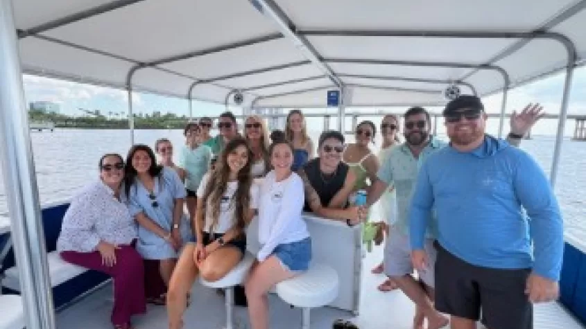 Passengers enjoying a team-building cruise.